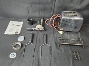 lot 182 image: Vintage Kitchen Appliance Collection Toaster, Cookie Press, and Accessories