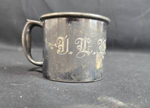 lot 192 image: Antique Benedict EPNS.B.M.M. 666 Silver-Plated Childrens Mug with King Cole Design