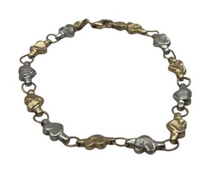lot 13 image: 7-inch 14K Gold Heart Shapes Tennis Bracelet (Stamped AU 14K) (3.7 grams)