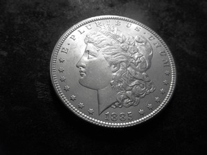 lot 15 image: 1885 Morgan Silver Dollar