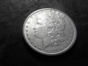 lot 26 image: 1899 O Morgan Silver Dollar