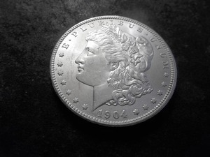 lot 29 image: 1904 O Morgan Silver Dollar