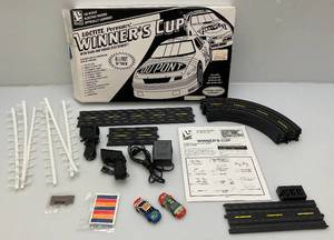 lot 42 image: Vintage Locktite Permatex Winners Cup HO Scale Race Track (Complete)