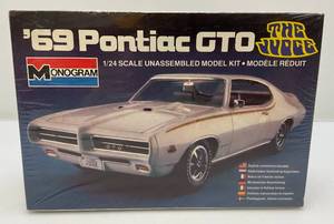 lot 94 image: 1982 Monogram 1969 Pontiac GTO 124 Scale Model kit (Factory Sealed)