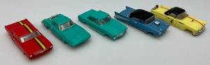 lot 101 image: 1960s MOTORIFIC Battery Operated Car Bobies Including  57 Bel Air, Mercedes, Mustang, T-Bird & Corvette