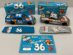 lot 122 image: Set Of Two Racing Champions Ernie Irvan #36 M&Ms Pontiac Grand Prix 124 Scale Die-Cast Nascar Cars (NIB)