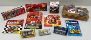 lot 123 image: Misc. NASCAR Collectibles Including Miniature Die-Cast Cars, Mini Skittles Racing Helmet And More (NIB)