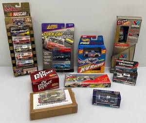 lot 124 image: Misc. NASCAR Collectibles Including Miniature Die-Cast Cars, JOHNNY LIGHTNING & More  (NIB)