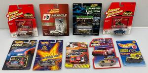 lot 128 image: Vintage Misc. JOHNNY LIGHTNING Miniature Die Cast Cars Including The Munsters Dracula & More (All New On Cards)