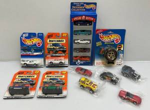 lot 131 image: Misc. Matchbox, Hot Wheels And More (New In Pack)