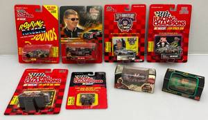lot 157 image: Misc. Miniature NASCAR Die Cast Cars Including Racing Champions & More  (NEW ON CARD)