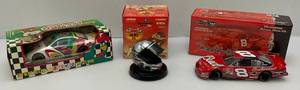 lot 210 image: Misc. Vintage NASCAR Die Cast Collectibles Including Two Cars And Miniature Helmet (NIB)