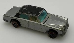 lot 243 image: 1969 Hot Wheels Redline Rolls Royce Silver Shadow SilverBack With White Interior Fair Condition (Tires Need Straightening)
