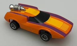 lot 295 image: Vintage Aurora AFX Slot Car Turbo Turn HO Slot Car Orange Multi Colored (Mint)