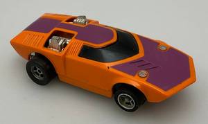 lot 297 image: Vintage Aurora AFX Too MUCH Orange & Purple HO Slot Car (MINT)