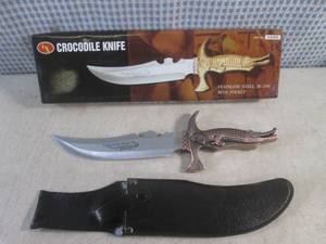 lot 40 image: (CNTR) 12 12 Decorative Crocodile...