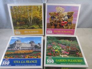 lot 92 image: (CSB) 4 New 550 Piece Puzzles - Uno...