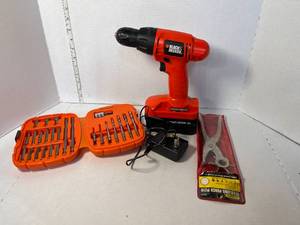 lot 87 image: Black & Decker Cordless Drill with Accessories and Revolving Punch Plier