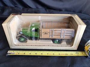 lot 21 image: Spec-cast 1934 Ford John Deere Truck