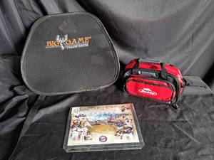 lot 78 image: Miscellaneous Lot (Tree Stand Back Rest, Berkley Tackle Box, Twins 1991 World Series Photo)