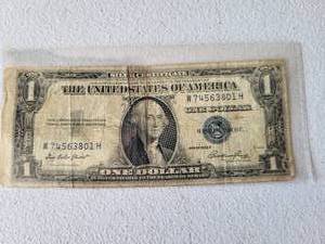 lot 83 image: 1935E Silver Certificate Liberty Dollar  -- W74563801H