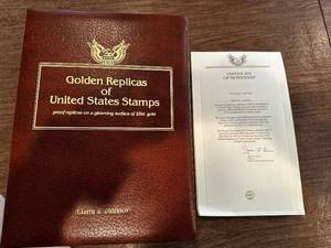 lot 6 image: Golden Replicas of United States Stamps Album with 22kt Gold Stamps