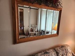 lot 55 image: Wall Mounted Mirror with Wooden Frame and Decorative Top