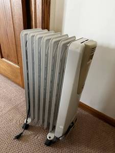 lot 130 image: DeLonghi Oil-Filled Radiator Heater on Wheels