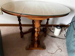 lot 142 image: Round Wooden Accent Table with Glass Top