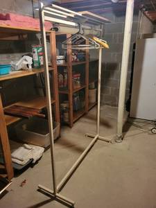 lot 191 image: Metal Clothing Rack with Assorted Hangers