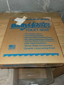 lot 209 image: BathMaster Toilet Seat with Mounting Hardware and Durable Finish