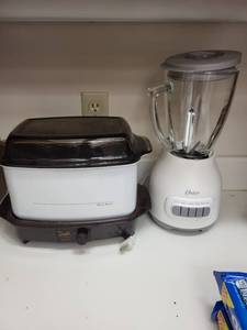 lot 242 image: West Bend Slow Cooker and Oster Blender Set