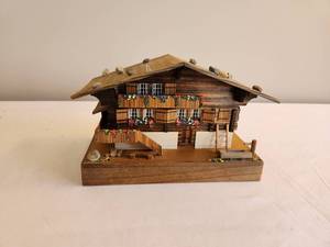 lot 230 image: Wooden Chalet Music Box