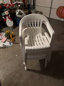 lot 407 image: Stackable White Plastic Patio Chairs