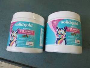 lot 20 image: 2 bottles of dog solid gold gut hea...