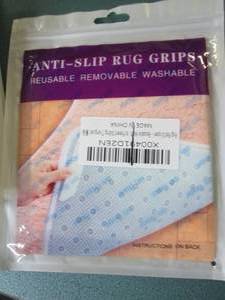 lot 133 image: 6 packages of anti slip rug grips...