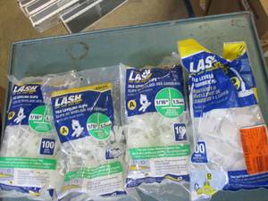 lot 192 image: lot of tile leveling clips...