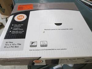lot 201 image: 5 packages of traffic master 12 x12...