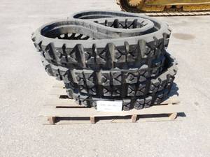 lot 10 image: New Set of Skid Steer Tracks - 320-86-50