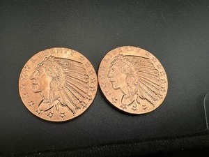 lot 97 image: Two Copper One Ounce Rounds