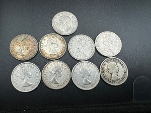 lot 52 image: Nine 80% Silver Canadian Quarters