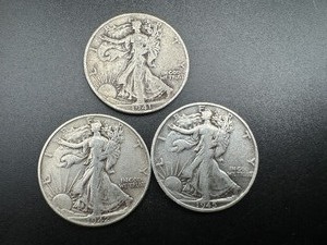 lot 55 image: Three Mid Minus Walking Liberty Halves