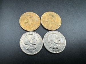 lot 67 image: Four Dollar Coins