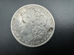 lot 71 image: 1887 O Better Date Morgan Dollar