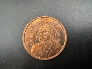 lot 77 image: 2010 BU 1oz Copper Lakota Bank Round
