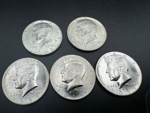 lot 79 image: Two 40% Silver & Three BU Kennedy Halfs