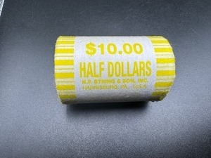 lot 84 image: Unopened Fed Roll Half Dollars
