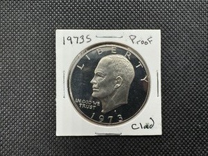 lot 33 image: 1973 S Proof Clad Eisenhower Dollar, Near Gem