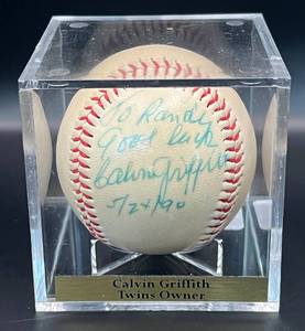 lot 9 image: Calvin Griffith (Twins Owner) Signed Baseball  w cube and plaque