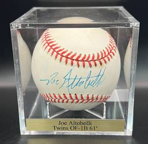 lot 25 image: Joe Altobelli Signed Baseball (Twins OF1B 1961) Rawlings OALB Budig Ball Minnesota Twins w cube and plaque